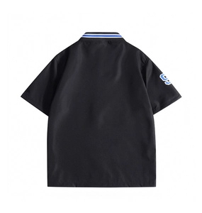 Detail view of the striped rib-knit polo collar and number patch on a black summer shirt