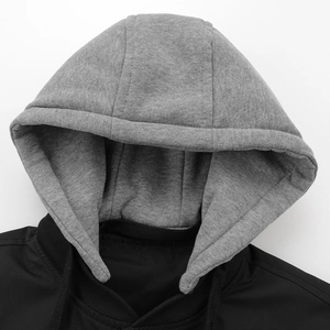 Detail of detachable grey hood and black windproof body on a casual jacket for men