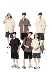 Detail view of summer loose utility shirts in beige, brown, and black textured fabrics