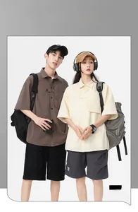 Detailed texture of fake two-piece short sleeve shirt with Chinese style buttons and pockets