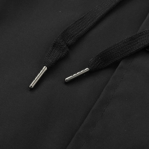 Close-up of black hoodie drawstrings with premium gunmetal aglets and fabric texture