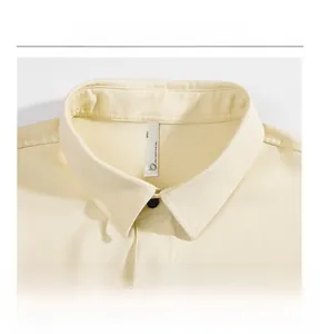 Detail view of cream ice silk shirt collar with fabric texture and size L tag