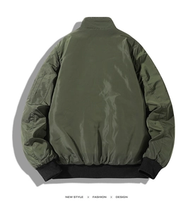 Detail of army green bomber jacket featuring ribbed collar and sleeve utility pocket