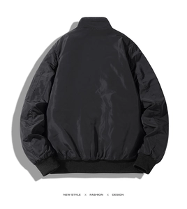 Rear view of black padded bomber jacket with ribbed cuffs and functional sleeve pocket