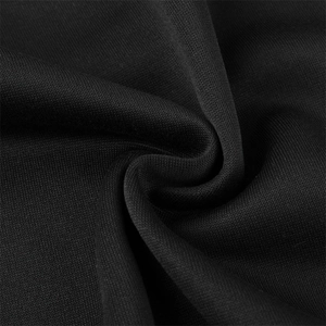 Macro shot of high-quality black knitted fabric texture on the baseball jacket
