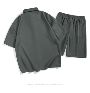 Detail view of the back of grey ice silk men's shirt and shorts leisure sport set