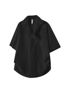 Men's black short sleeve shirt with textured seersucker fabric and casual button-down collar