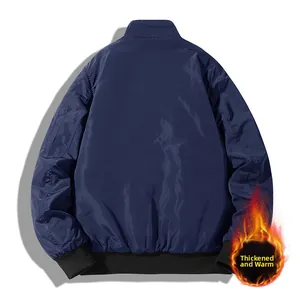 Back view of a padded navy blue bomber jacket showing ribbed cuffs and sleeve zip pocket