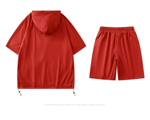 Back view of red hooded short sleeve jacket and shorts set with functional texture