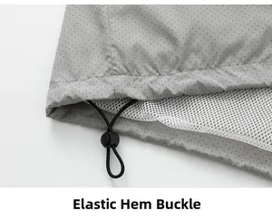Detail of adjustable elastic drawstring hem on breathable mesh-lined outdoor jacket
