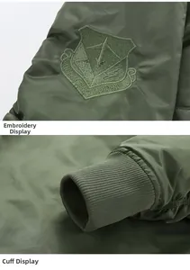 Military green MA1 bomber jacket featuring embroidered sleeve patch and ribbed knit cuffs
