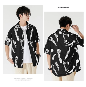 Front and back view of men's loose fit black Hawaiian shirt with white abstract prints