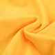 Macro shot of bright yellow knitted fabric texture with soft drapery and fine weaving