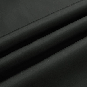 Close-up of black breathable woven fabric texture with fine diagonal twill detail