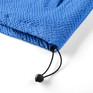 Macro detail of blue waffle texture fabric with adjustable drawstring and toggle closure