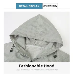 Detail of hooded sports jacket showing breathable micro-perforations and white mesh lining