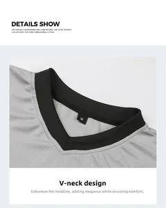 Close-up of gray sports jersey featuring black V-neck design and breathable mesh fabric