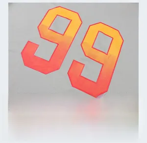 Close-up of breathable grey mesh fabric with orange gradient number print and logo