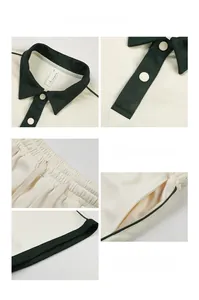 Détail du col polo contrasté et de la taille élastique à cordon sur l'ensemble de sport