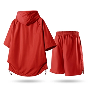 Detailed back view of red breathable mesh tracksuit showing hood and drawstring hem