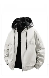 Detail view of men's casual hooded jacket with stylish black and white plaid lining
