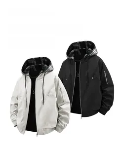 Detail of loose-fit windproof jackets with plaid hood lining and utility sleeve pockets