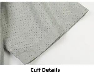 Detailed view of the cuff stitching and breathable micro-perforated mesh fabric in grey