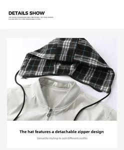 Detail of light grey jacket featuring a detachable zippered hood with plaid lining