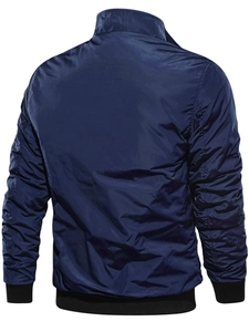 Rear view of navy blue men's bomber jacket featuring black ribbed cuffs and waistband