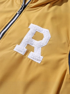 Men's yellow baseball jacket featuring white towel embroidered R letter and zip closure