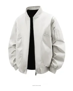 Detail of light grey bomber jacket featuring sleeve zipper pocket and ribbed cuffs