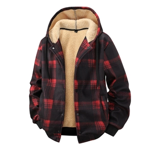 Detail view of red plaid jacket featuring soft white fleece lining and ribbed hem