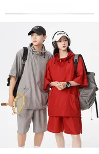 Detail of breathable mesh fabric on short sleeve hooded sportswear set for summer
