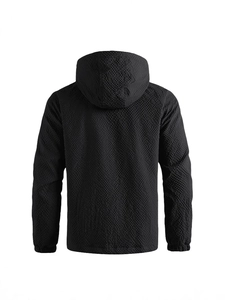 Rear view of a black hooded outdoor sports jacket with breathable micro-grid texture