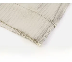 Detailed macro view of the ribbed knit hem with neat stitching on this men's polo sweatshirt