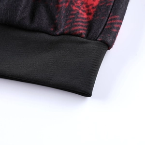 Detailed macro view of winter hooded jacket fleece fabric and black elastic ribbed cuffs