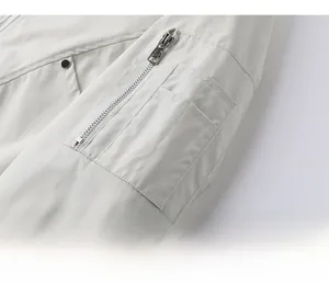 Detail of sleeve zipper pocket and pen slots on men outdoor sport jacket