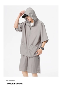 Detail of grey short sleeve hooded tracksuit showing breathable mesh fabric and zipper