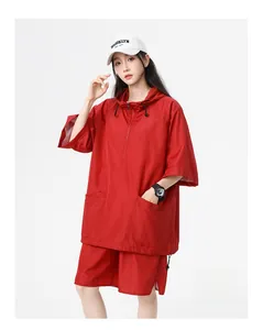 Detail of red quick-dry hooded short sleeve top and shorts set with breathable fabric