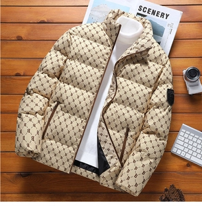 Flat lay of men's beige monogram quilted puffer jacket with stand collar and zipper detail