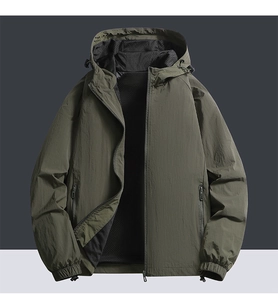 Detail of olive green hooded jacket showing zipper pockets and breathable mesh lining