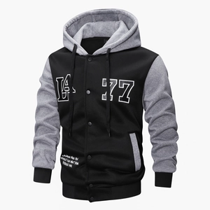 Macro detail of men's hooded baseball jacket showing 77 LA print and ribbed cuffs