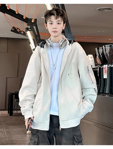 Detail of light beige bomber jacket featuring a utility sleeve pocket and stand collar