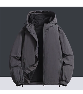 Detail view of hooded windbreaker featuring mesh lining and adjustable drawstrings