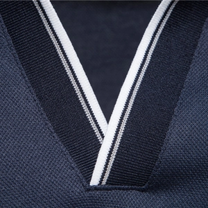 Men's navy blue knit polo shirt with striped V-neck collar detail and deer embroidery