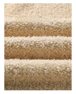 Close-up of thick fleece lining showing warm texture on men plaid hooded jacket