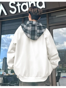 Rear view of white men's outdoor jacket with a black and white checkered hood detail