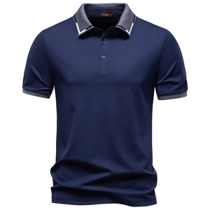 Close-up of navy blue polo shirt with grey ribbed collar and striped detail on buttons