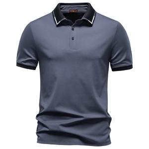 Detail of dark grey Polo shirt showing black ribbed collar with white stripes and S size tag