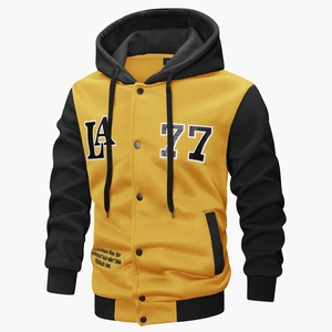 Detail of hooded baseball jacket showing yellow body with black sleeves and LA embroidery